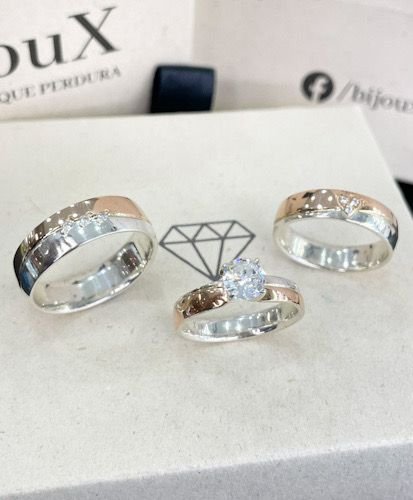 Argollas mitad plata mitad oro rosa 18k (PREVENTA DISPONIBLE POR WHATS APP)